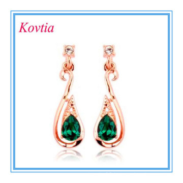 2014 hottest product jewelry gold dangle earring filled with green crystal